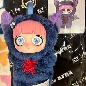 Kiki Blue and Pink Bat Plush Collectible with Collectors Card